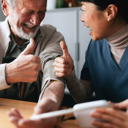 Old man talking to caregiver